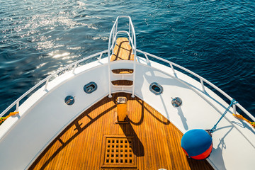 Beautiful view from a bow of yacht at seaward. Sailing. Luxury yachts. Boats in sailing regatta. Summer vacation and voyage concept