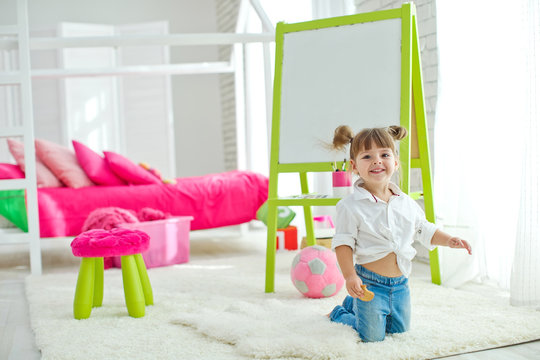 A child plays in the children's room 