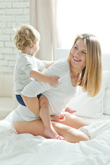 Woman with child at home 