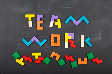 Teamwork creative concept concept jigsaw on the blackboard