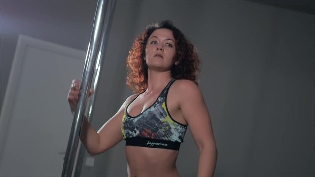 Strip plastic pole, dance floor training with professinal sport acrobatics
