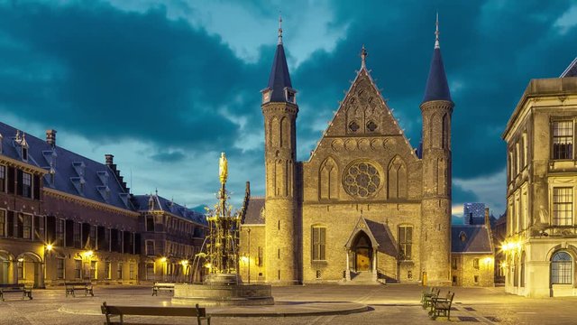 Illuminated gothic facade of Ridderzaal or Hall of Knights in Binnenhof, Hague, Netherlands (static image with animated sky)
