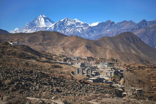 Ranipauwa (Muktinath) village with Dhaulagiri peak at the background in Himalayas, Nepal