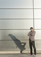 young man posing and breakdancing