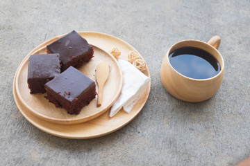 Homemade delicious chocolate cake served with hot coffee