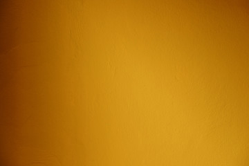 Closeup on yellow cement background