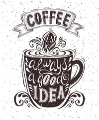 Quote on coffee cup.