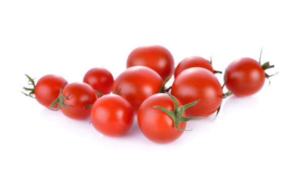 fresh tomato with stem on white background