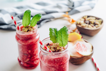 Grapefruit smoothie with muesli cereal