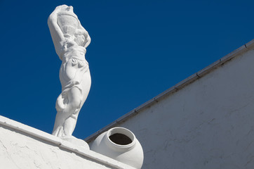 Classic statue with vase