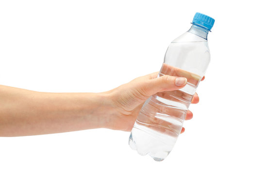 hand of young girl holding water bottle