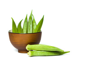 Okra in a bowl isolated over white background