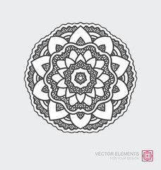 Floral abstract ornament of round shape. Mandala, graphic elements are drawn by hand. Modernistic Art.