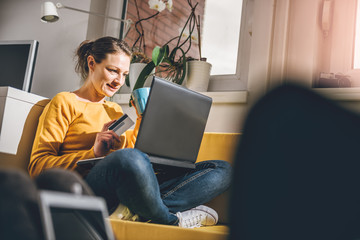 Woman using credit card