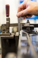 Inspection  is check gap and dimension part in car factory
