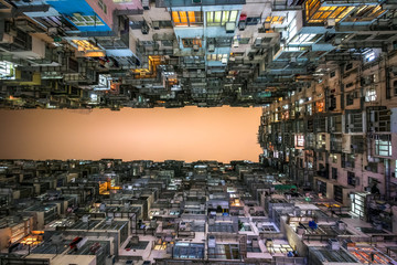 Low angle view of crowded residential towers in an old community in Quarry Bay, Hong Kong. Scenery of overcrowded narrow apartments, a phenomenon of high housing density & housing blues in Hongkong.