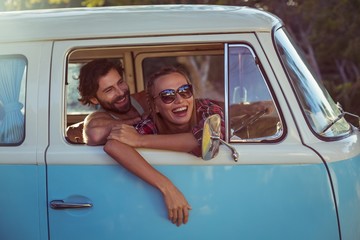 Couple sitting in a campervan