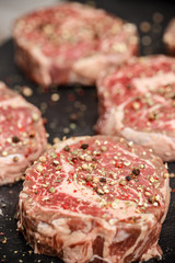 Raw meat steaks