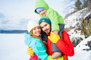 Family on a winter lake