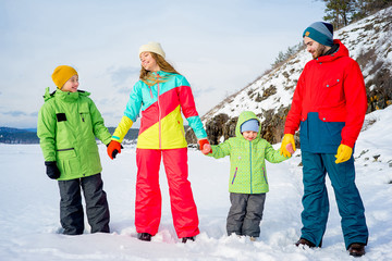 Family on a winter lake