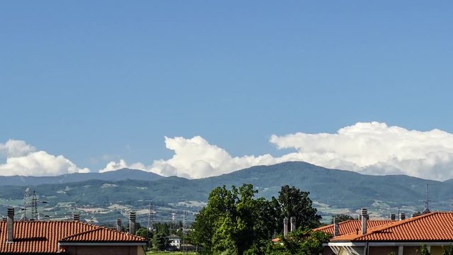 4K Time-lapse Clouds roll over the Apennines Italy
