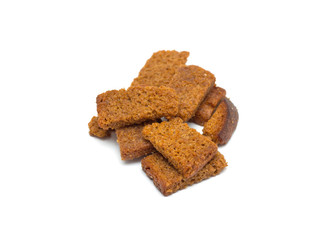 Many small salty dried rusks isolated on white