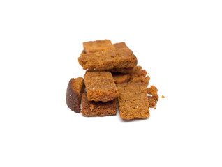 Many small salty dried rusks isolated on white