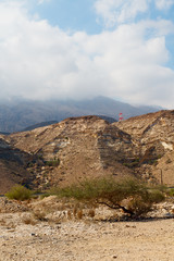 in oman  the old mountain gorge and canyon the deep cloudy  sky