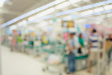Supermarket store blur background ,Cashier counter with customer