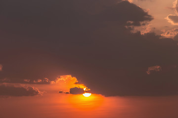 Colorful dramatic sky with cloud at sunset.Sky with sun background.