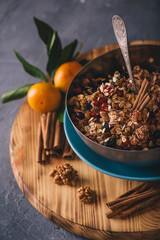 Ingredients for making oat cookies served with fresh mandarins