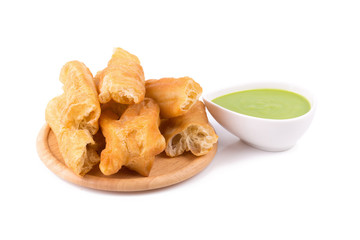 deep fried dough stick and steamed custard on white background