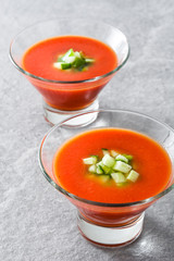 Traditional Spanish cold gazpacho soup on gray stone
