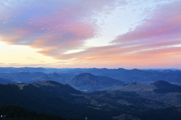 Majestic sunset in the mountains landscape. Dramatic sky. Carpathian, Romania, Europe.