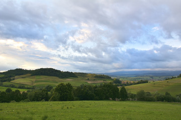 Fototapeta na wymiar Green hills in mountain valley. spring landscape