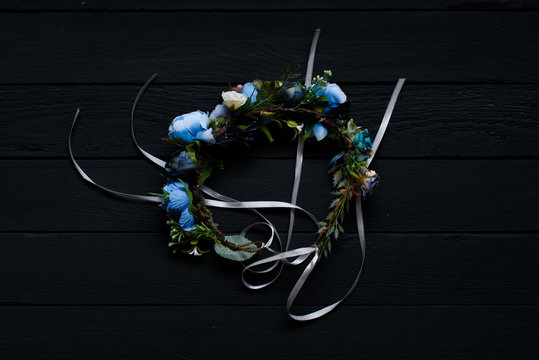 Flower wreath hairpin with flowers isolated on black background