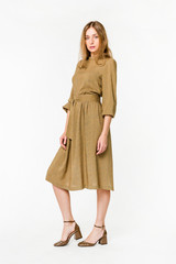 Young elegant female in light summer dress, over white background