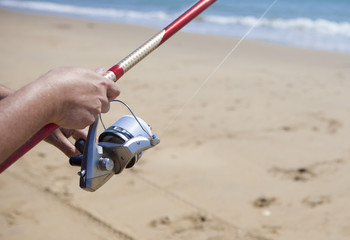 Folding the fishing line on the beach