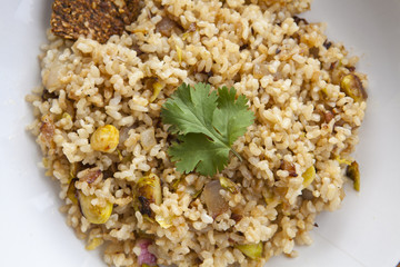 cooked integral rice with vegetables, closeup