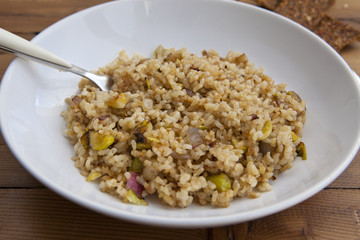 cooked integral rice with vegetables, closeup