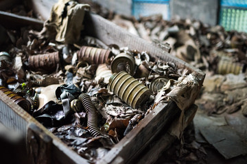 abandoned school room with masks in box on the floor in Pripyat, Chernobyl, Ukraine