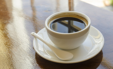 Coffee cup in coffee shop interior