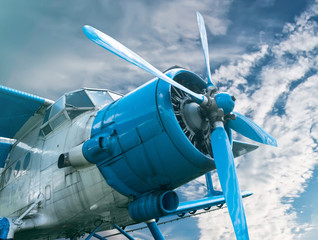 plane with propeller on beautiful bright sky background