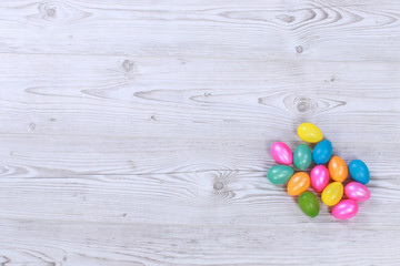 Easter eggs on grey wooden ground