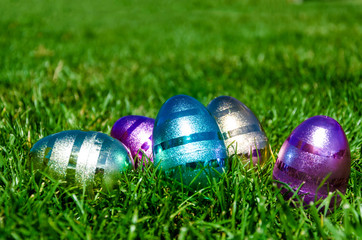 Easter eggs on the grass background