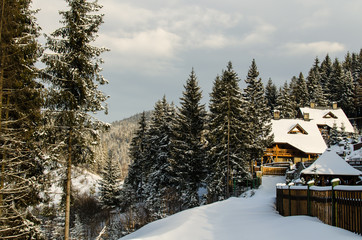 Snow-covered hotel in the beautiful winter Carpathian mountains. Ukraine