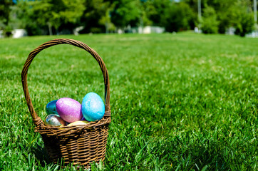 Easter eggs on the grass background