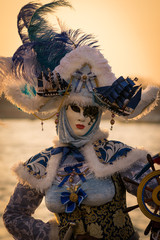 Obraz na płótnie Canvas beautiful carnival mask in venice in blue and white