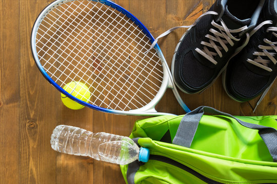 Green Bag For Sports Racket For Tennis On The Floor