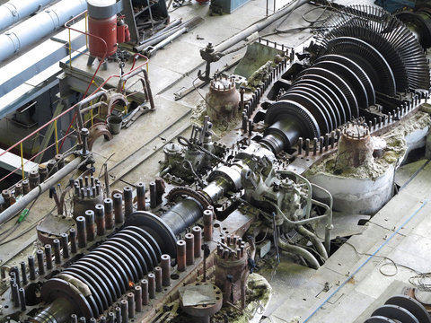steam turbine in repair process, machinery, pipes, tubes, at power plant